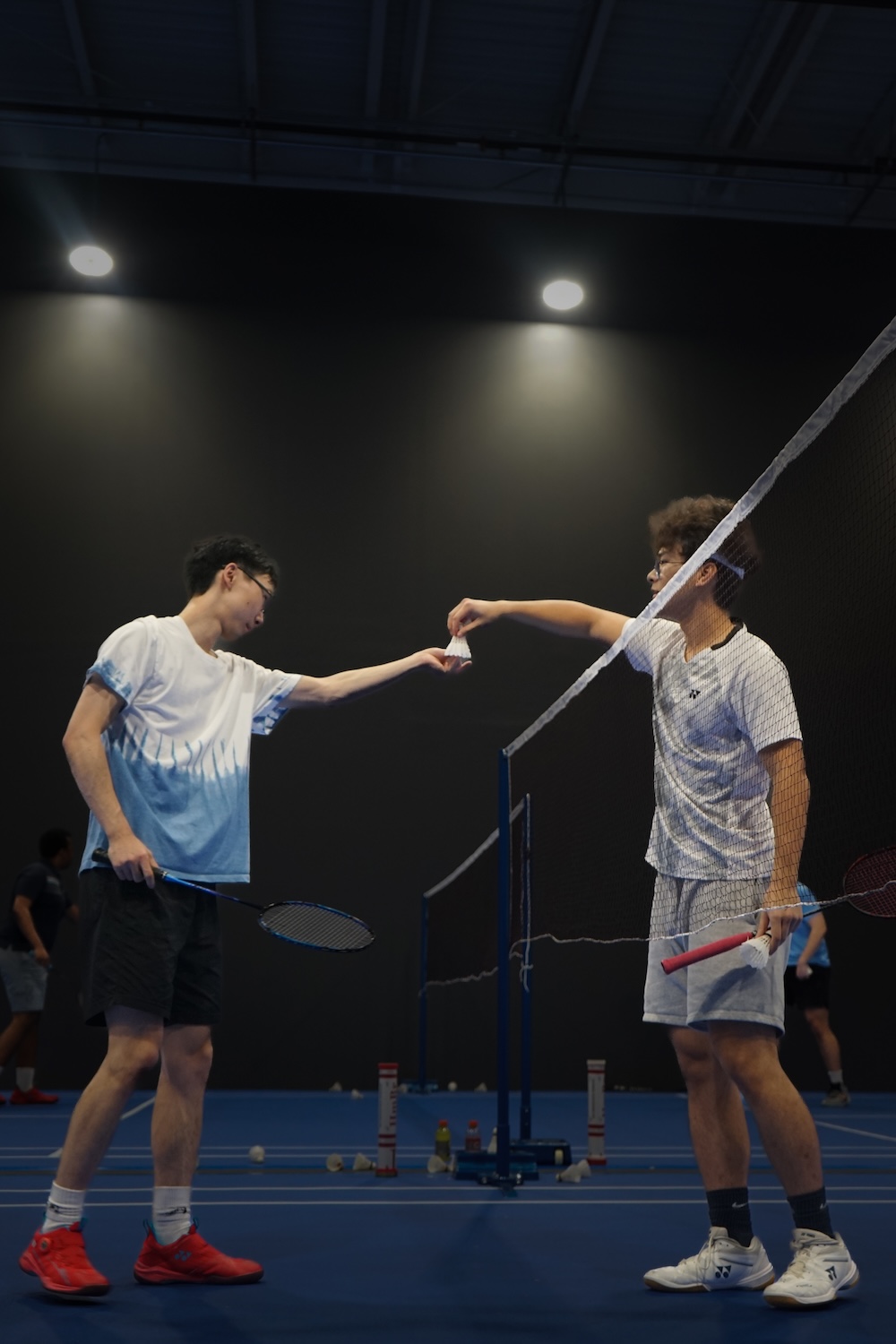 KSU Badminton Club members participate in a match. 
