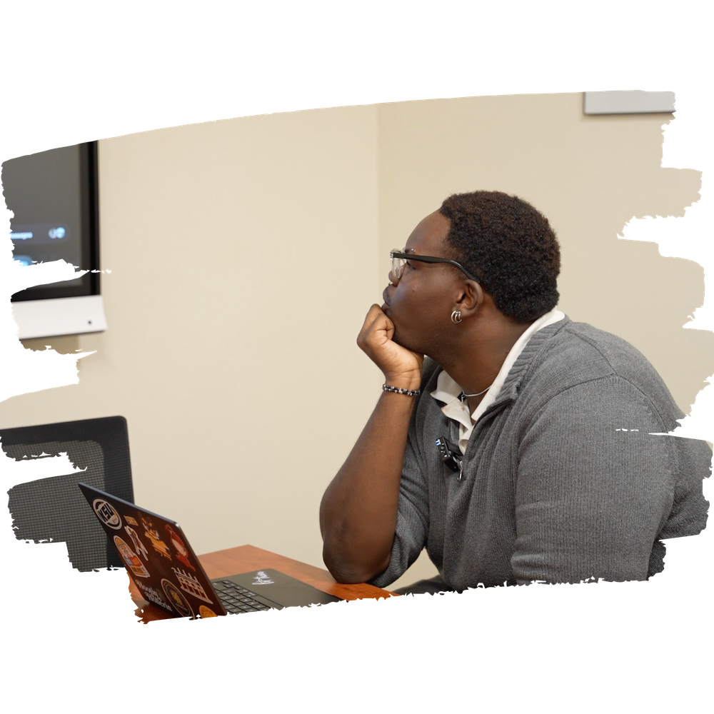 C.J. Howard working on a computer.
