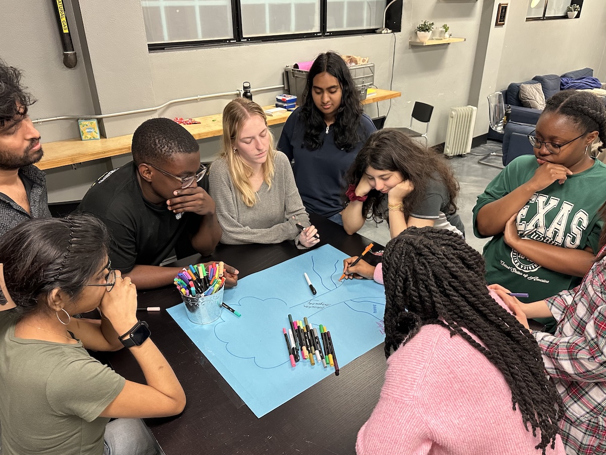 Owl Serve students discussing their trip