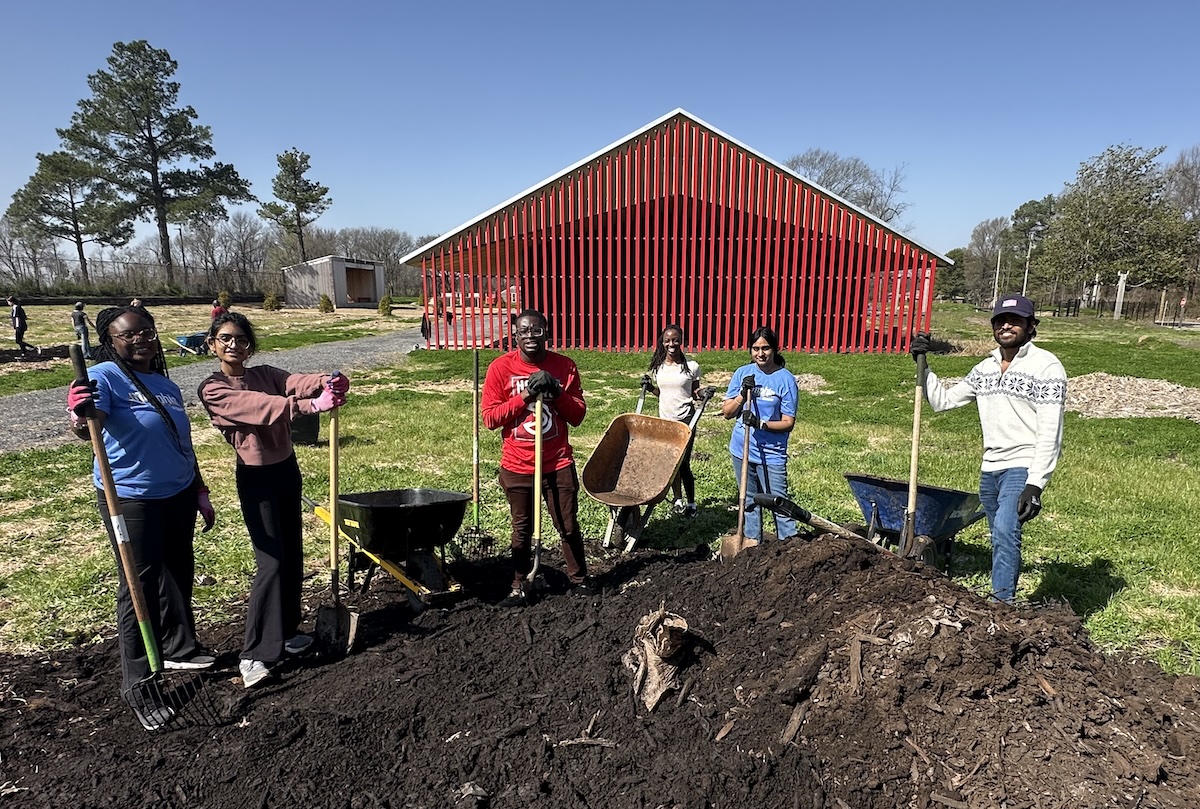 Owl Serve Students farming on Spring Break