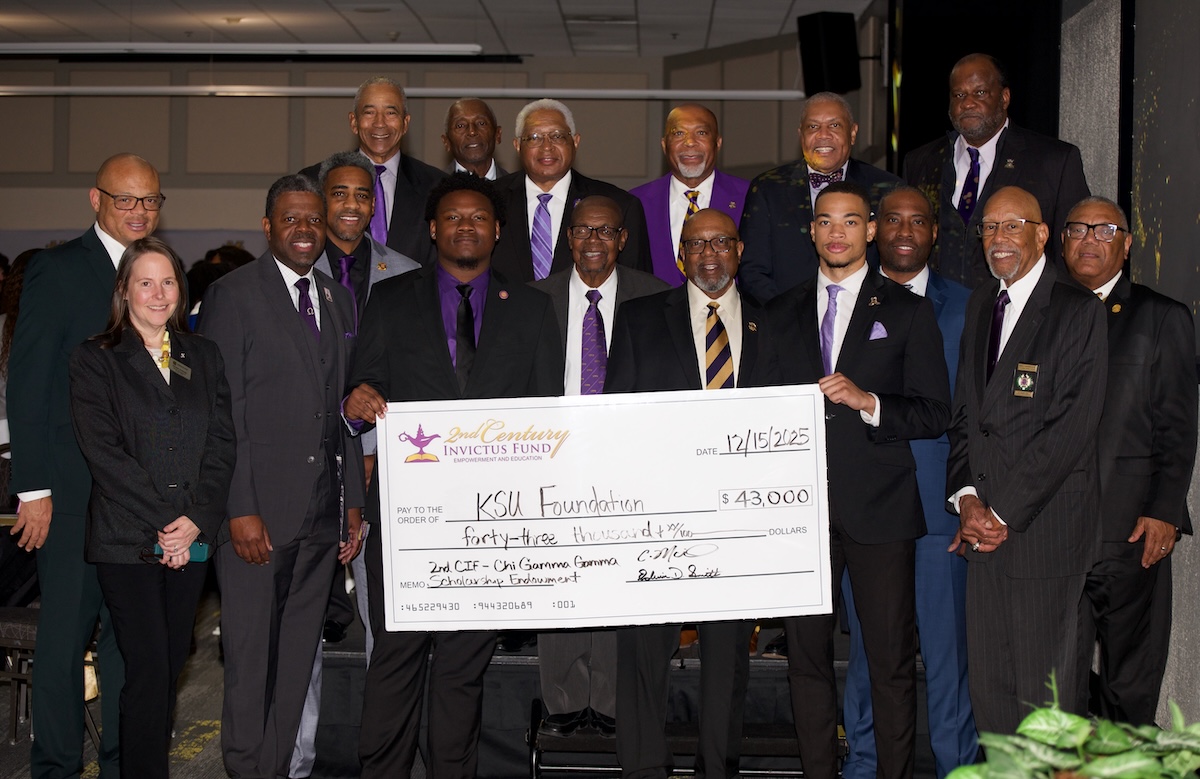 Chi Gamma Gamma Chapter give check to Kennesaw State Univeristy