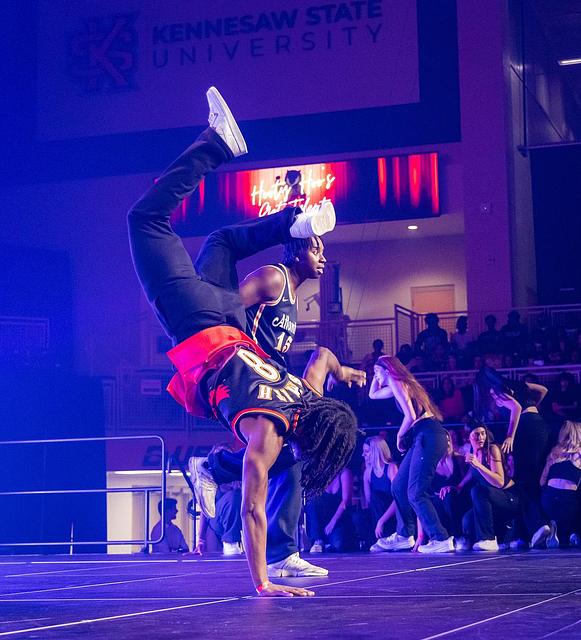 student dancing in the hooty hoo's got talent competition