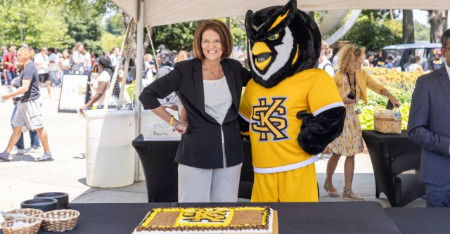 First year cake event with president schwaig and scrappy