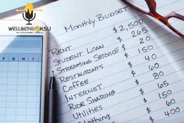 Budgeting list with a pen and glasses