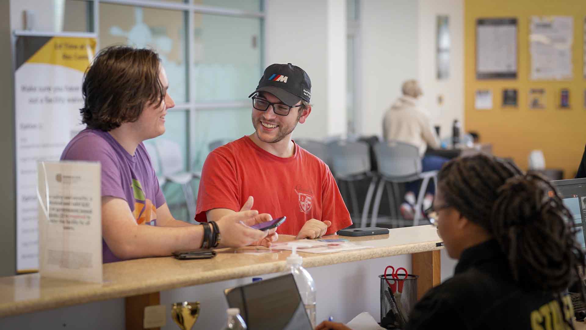 Students being helped at Service Desk