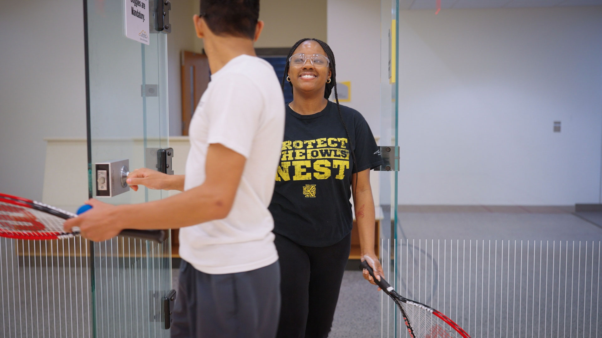 students playing racquetball