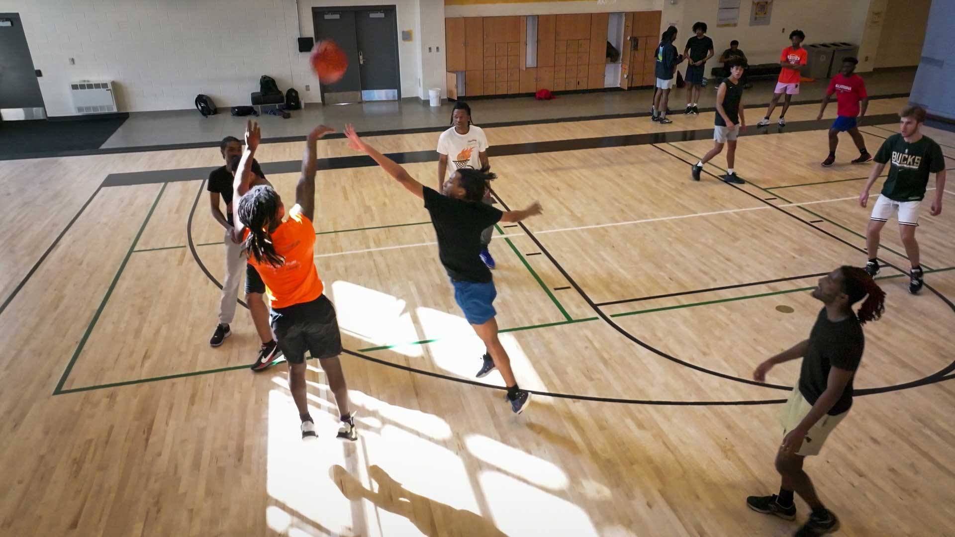 Students playing basketball