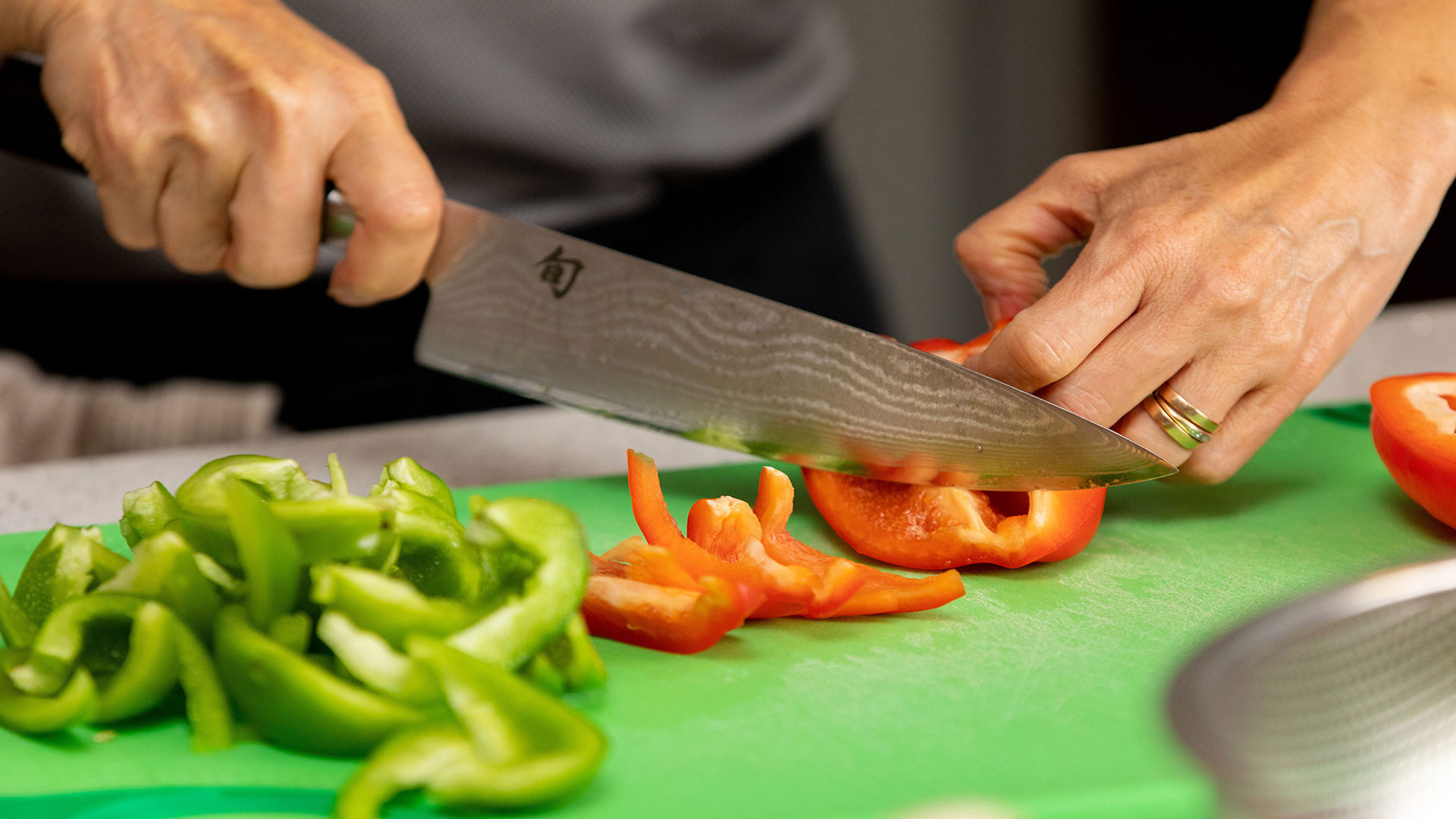 knife chopping peppers