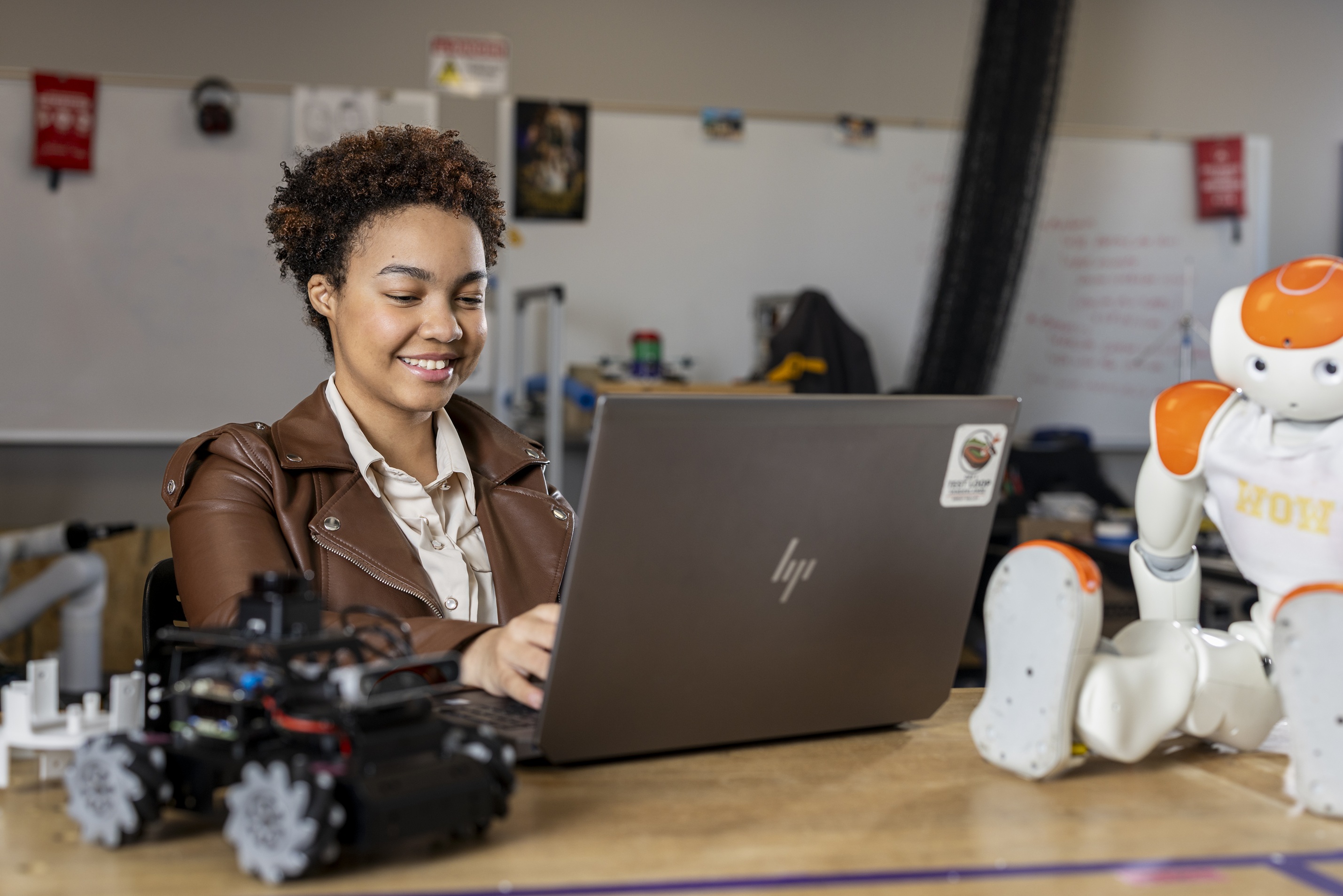 student intern working at a computer