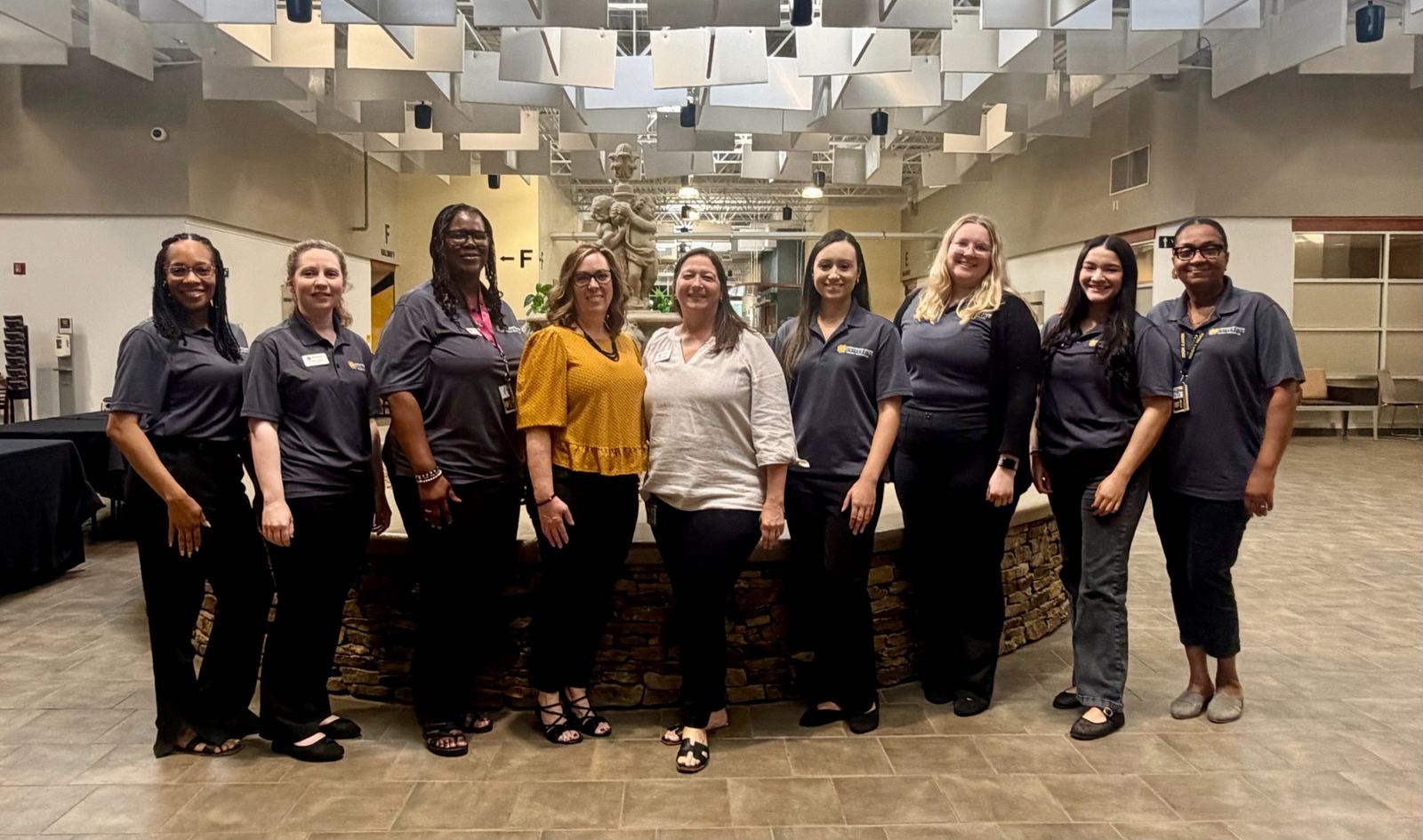 HR coordinators posing for a pic at the 2026 New Employee Orientation for faculty