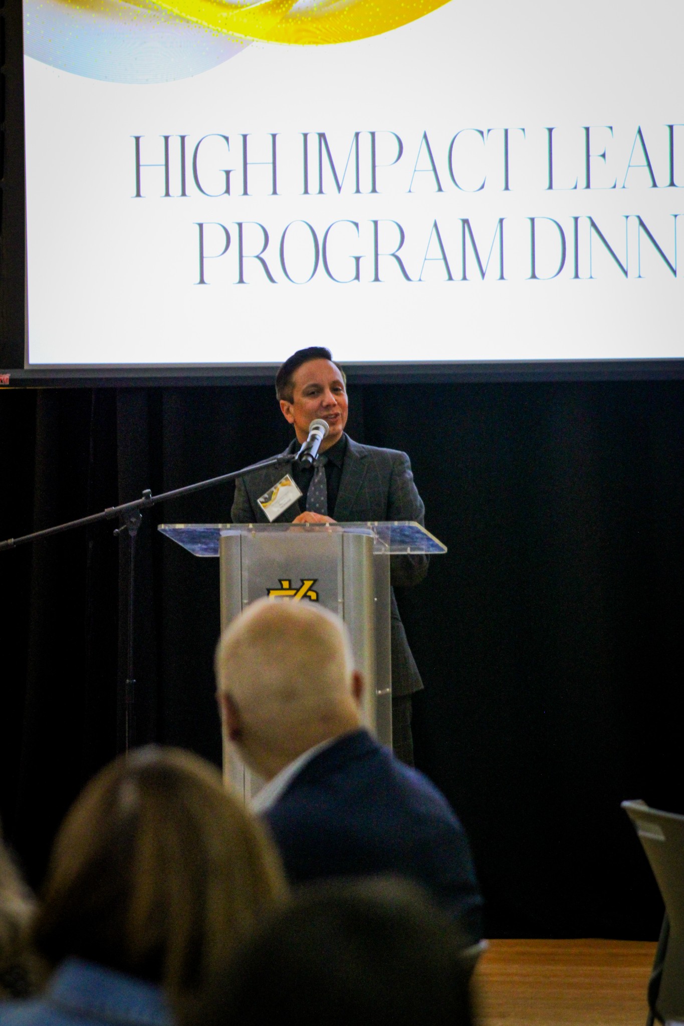 Provost Pulinkala speaking at the 2026 HILP graduation dinner