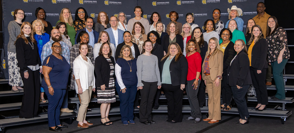 HR employees posing for a group picture at the A&F Awards Ceremony in 2025