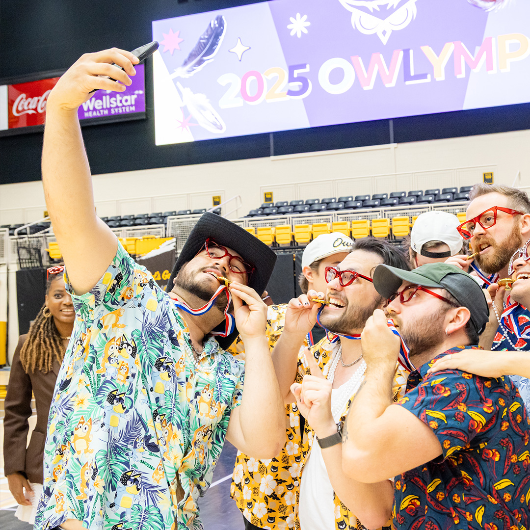 friends taking selfie at KSU's owlympics