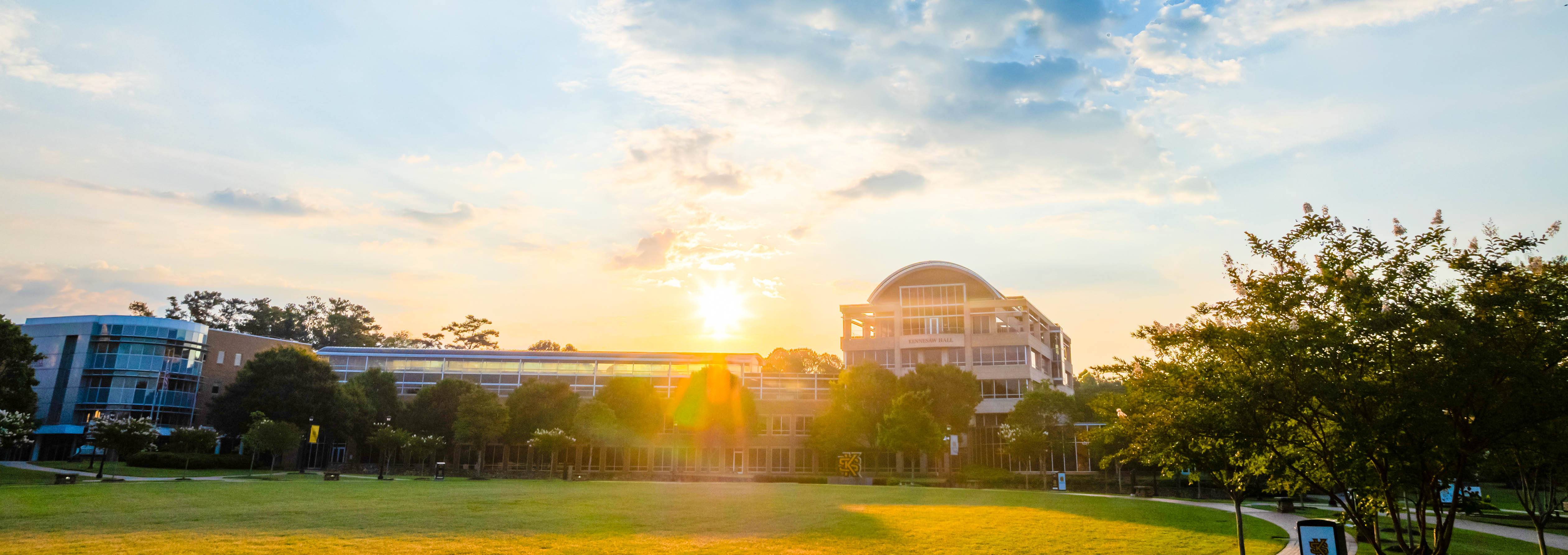 exterior of ksu campus building with sun glare