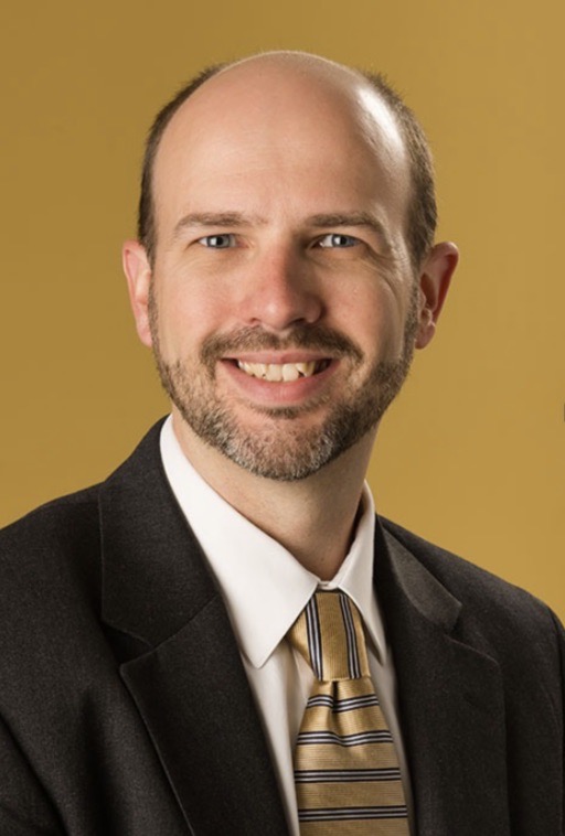 professional headshot of Zach Kerns