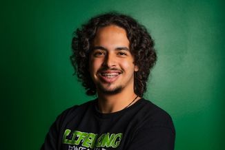 Christopher Crosby poses for his company headshot.