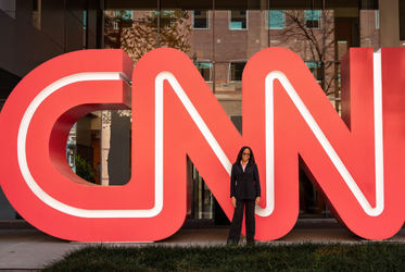 Jessica Okafor stands in front of the CNN sign.