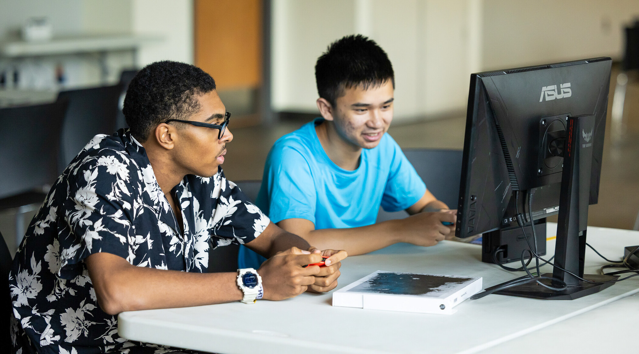 students at a laptop