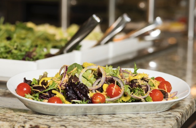 house salad with red onions and red cherry tomatoes