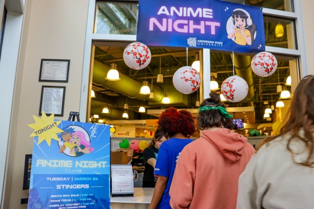 students waiting in line at anime night