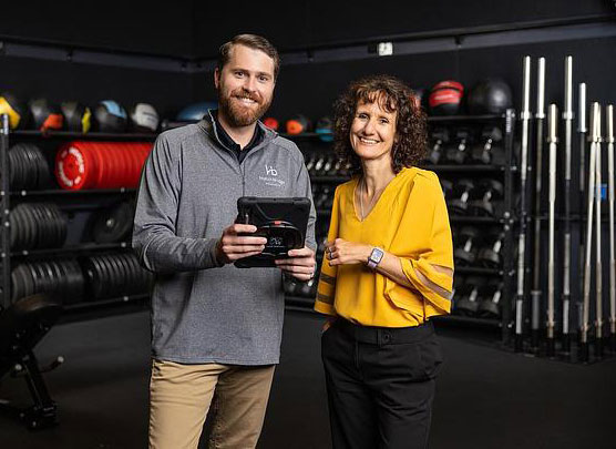Dr. Christopher Cornelison standing next to Karin Scarpinato