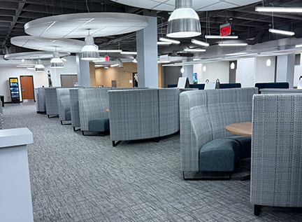 Grop seating on the first floor of Sturgis Library with whiteboards