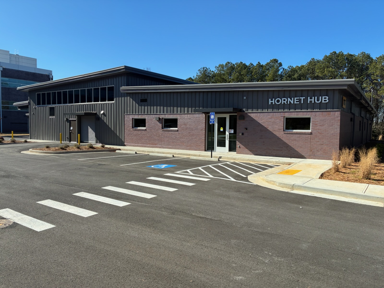 Exterior view of the new hornet hub building from the front parking lot
