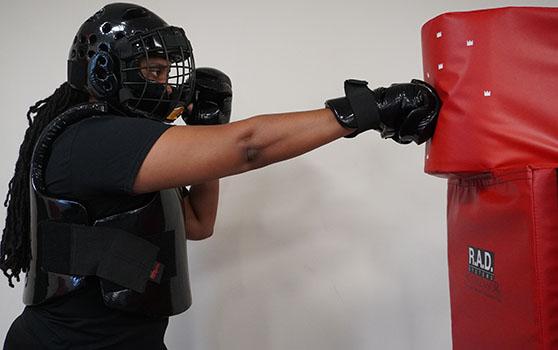 woman punching bag