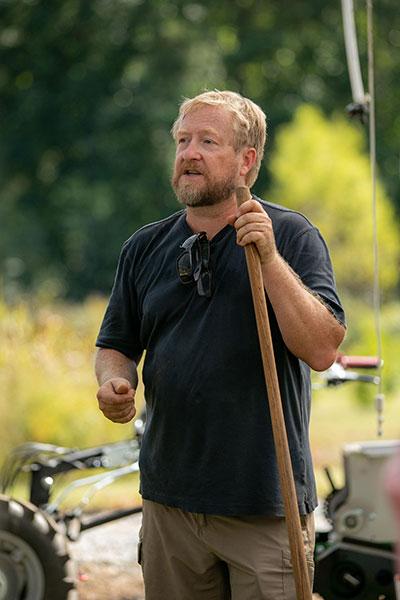 Small Farm Tools Demonstration Day  / KSU Field Station operations manager Michael Blackwell talks with members of the public during the Small Farm Tools Demonstration Day.