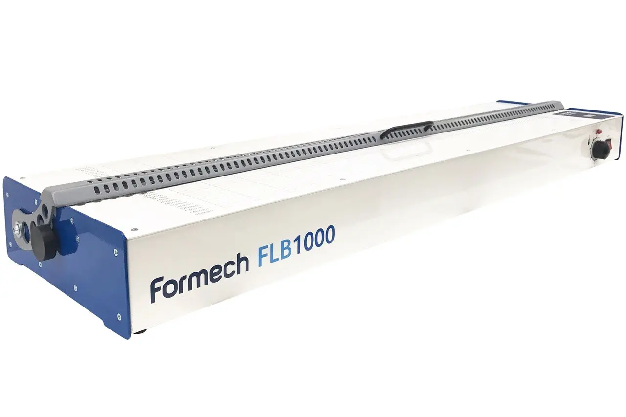 White and blue Formech FLB1000 industrial machine with a ventilated top and control knob.
