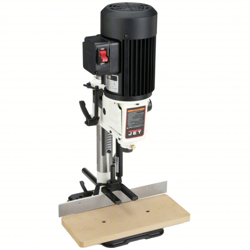 Black-and-silver JET benchtop mortising machine with a wooden worktable and metal fence.