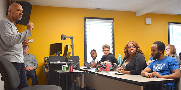 students in a class in the Coles College of Business