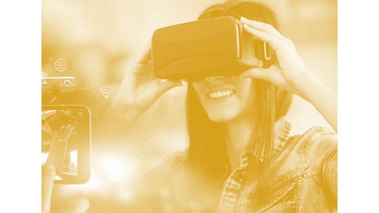 person smiling while wearing virtual reality headset