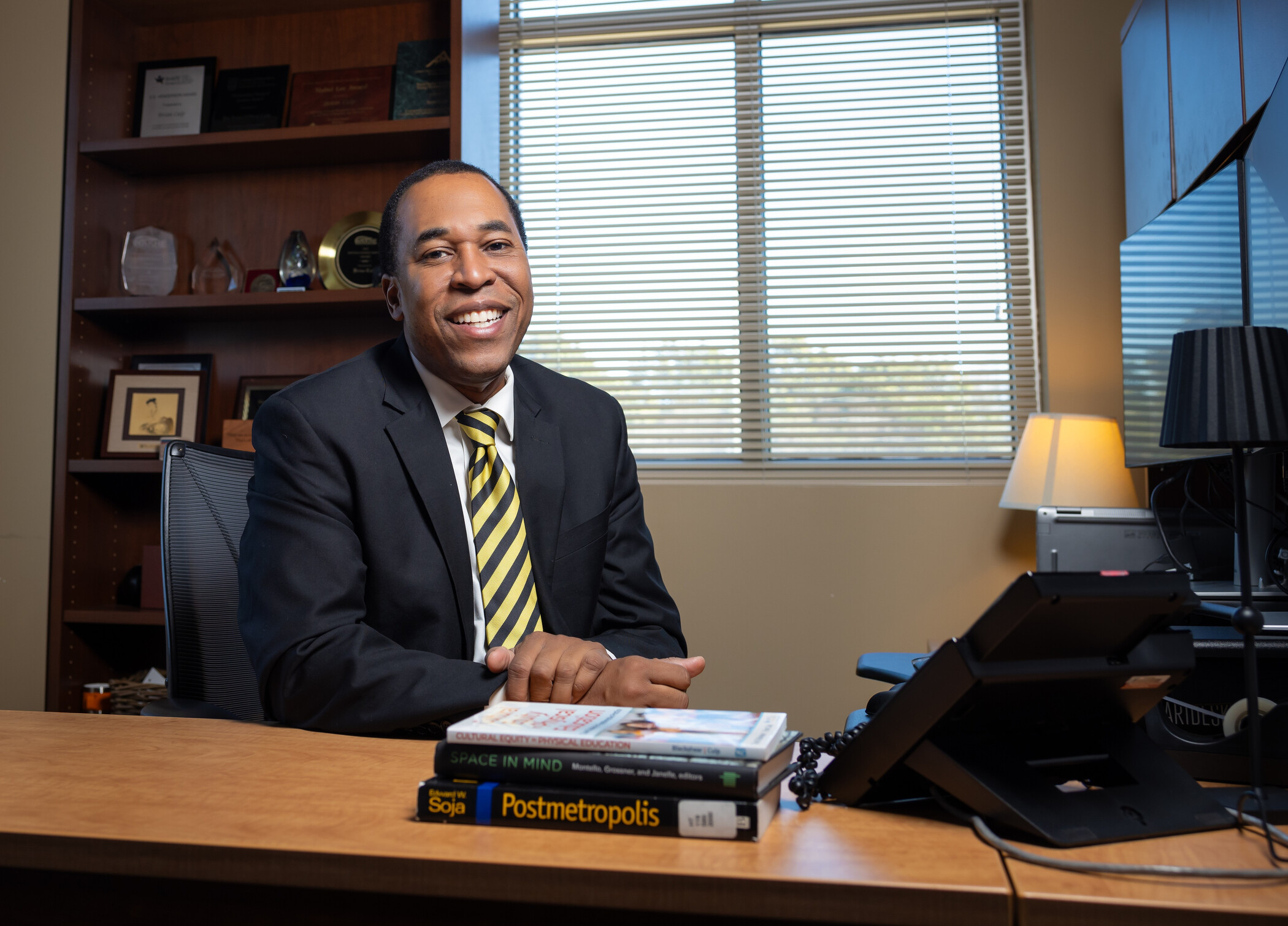 man sitting at desk