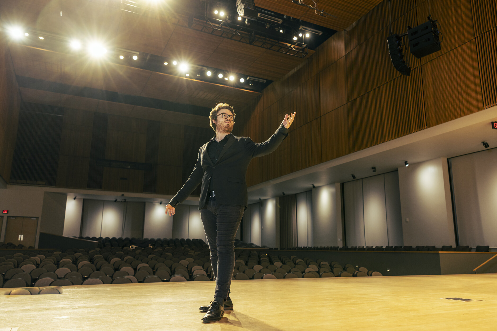 student performing on stage