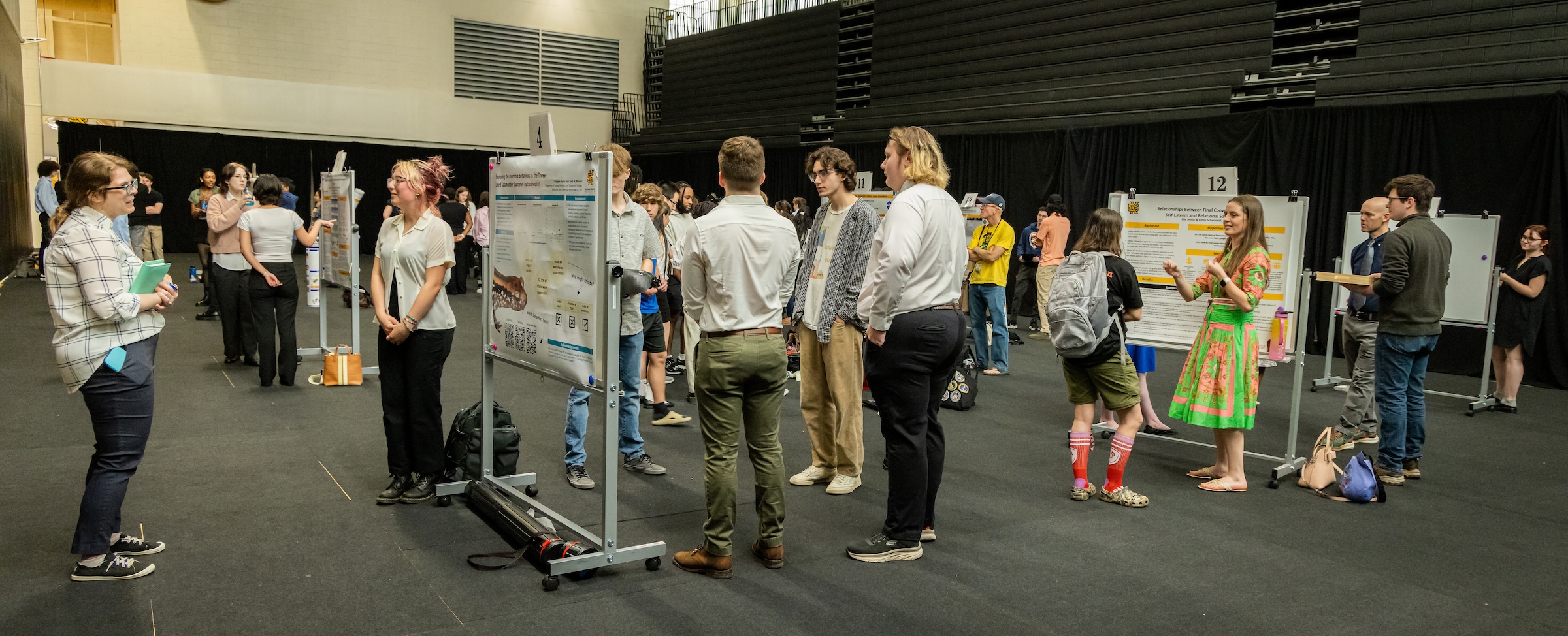 symposium wide shot of posters