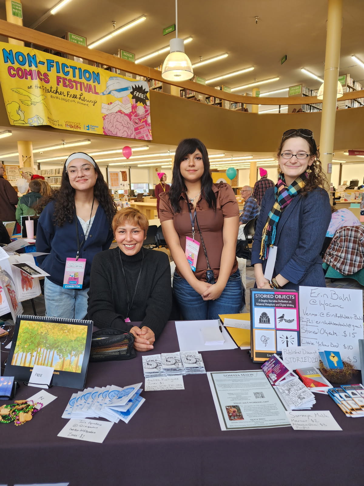 team picture with three students and faculty