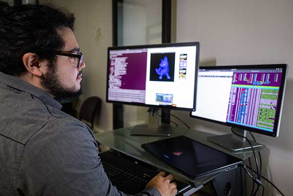 seo writer editing code on the computer screen