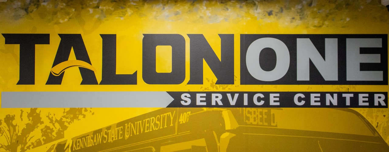 gold wall in talon one servce center featuring the talon one logo